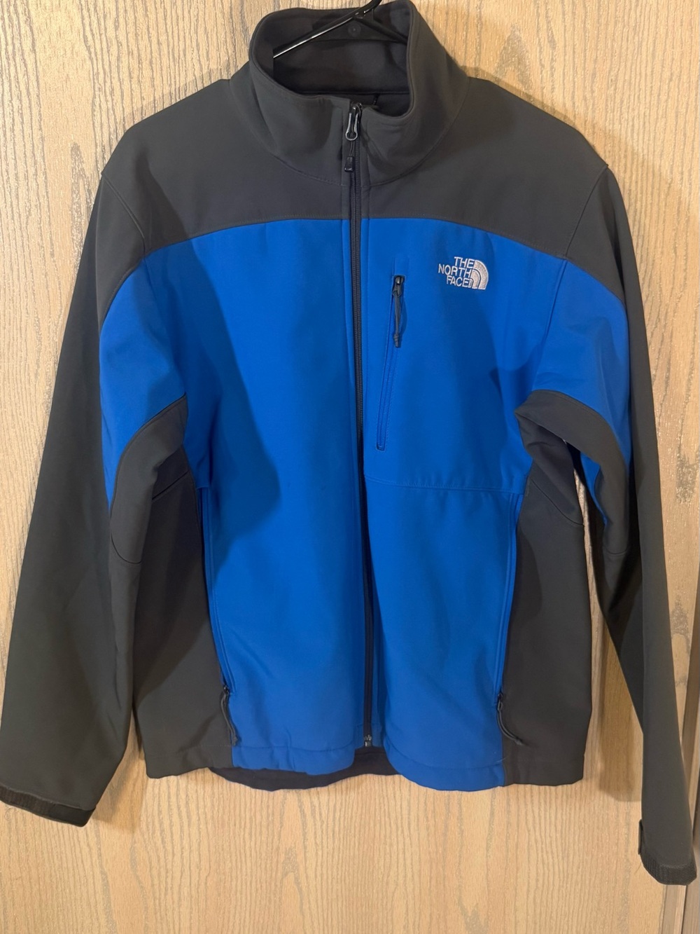The North Face Men’s Blue and Charcoal Softshell Jacket